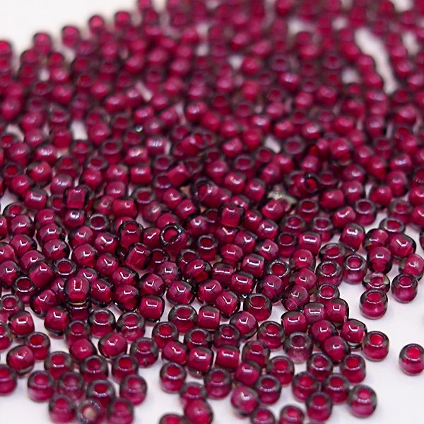 Бисер круглый 11/0 #1075 Прозрачный с малиновым прокрасом